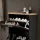 Armoire à chaussures STIVIO à 2 portes, noire, 60 cm, miroir ovale à LED avec cadre (3 intensités déclairage)