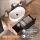 ARISA Bathroom Furniture Set, including a tall cabinet in black ribbed finish – with "ARIA" mirror cabinet and white ceramic countertop sink (55 cm)