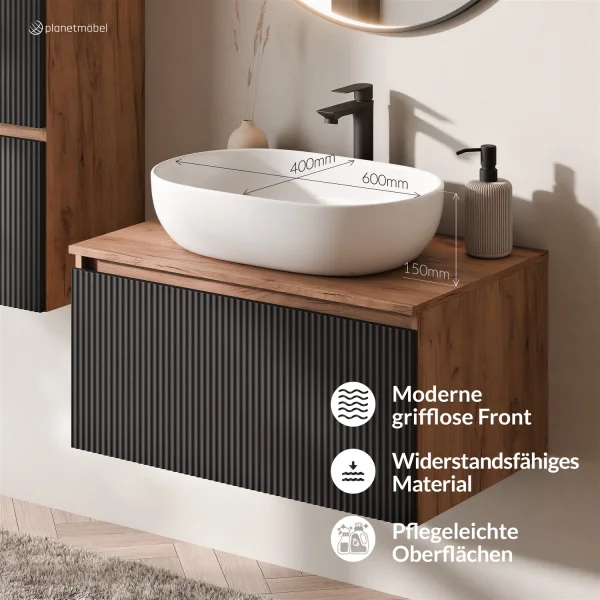 ARISA Bathroom Furniture Set, including a tall cabinet in black ribbed finish—with a "Glora" LED mirror and a white ceramic countertop sink (60 cm)